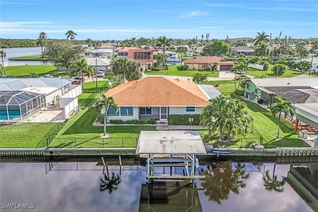 drone / aerial view featuring a water view