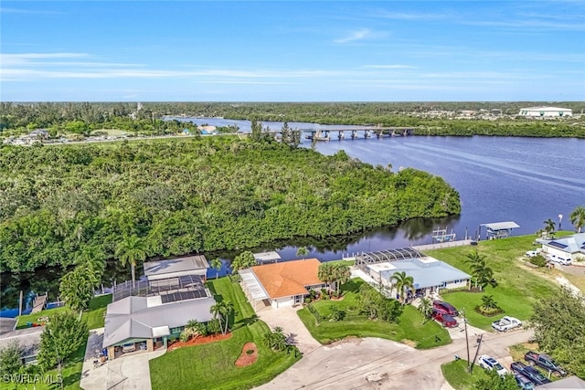 drone / aerial view with a water view