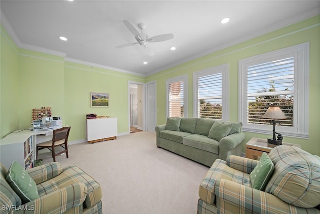 living room featuring light carpet, ceiling fan, and crown molding