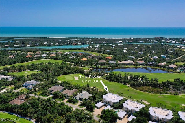 drone / aerial view with a water view