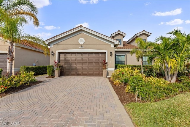 view of front of property featuring a garage