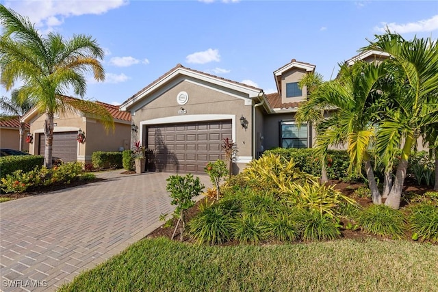 view of front of home with a garage