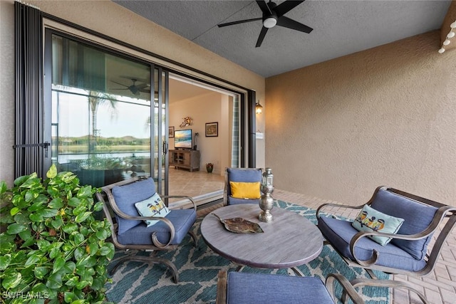 view of patio with ceiling fan