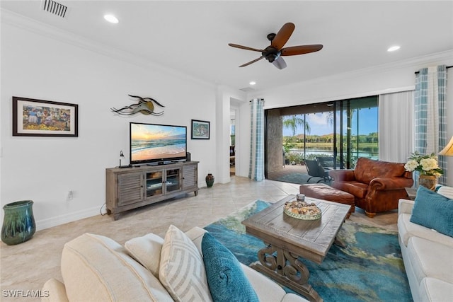 tiled living room featuring ceiling fan and crown molding