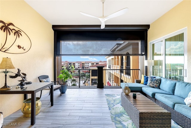 interior space with hardwood / wood-style floors and ceiling fan