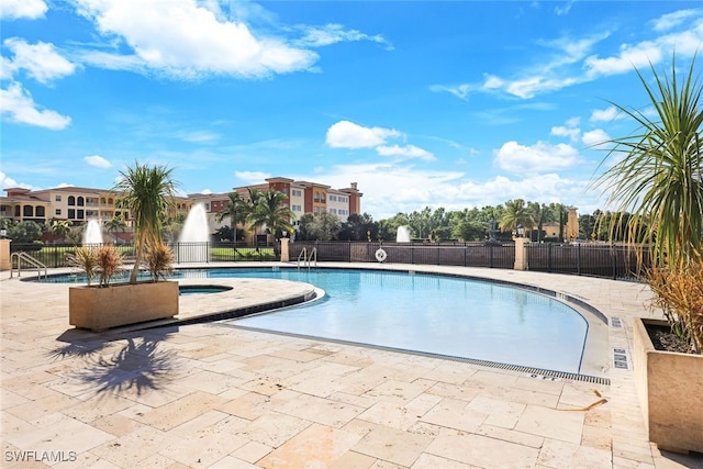 view of pool featuring a patio area