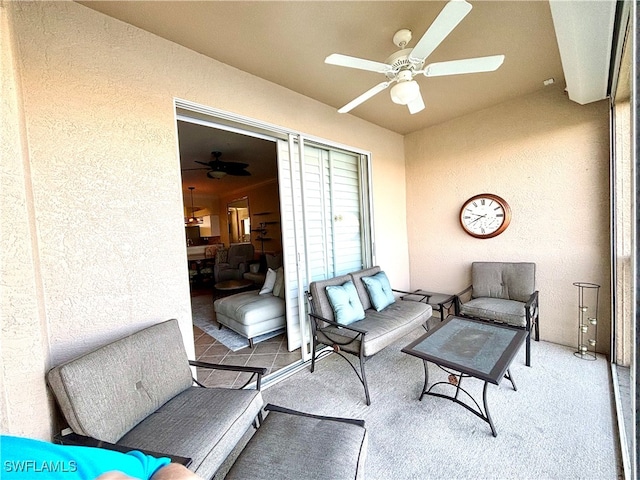 view of patio featuring outdoor lounge area and ceiling fan