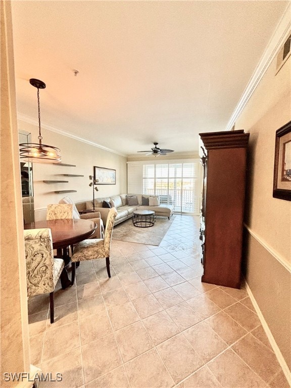 tiled living room featuring ceiling fan and ornamental molding