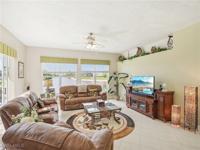 tiled living room featuring ceiling fan