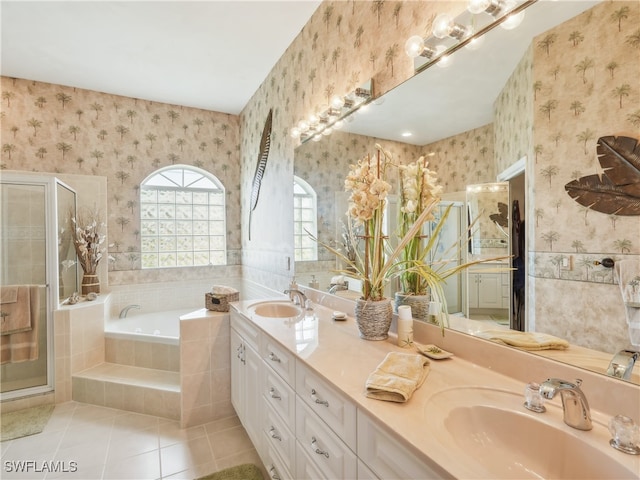 bathroom featuring tile patterned flooring, vanity, and independent shower and bath