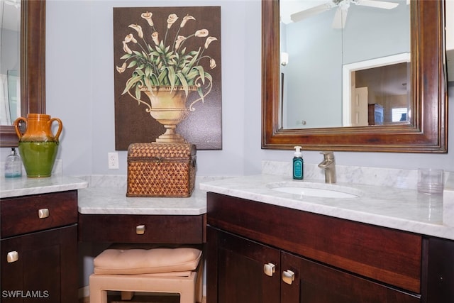 bathroom featuring vanity and ceiling fan