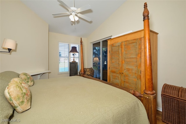 bedroom featuring access to outside, hardwood / wood-style flooring, ceiling fan, and lofted ceiling