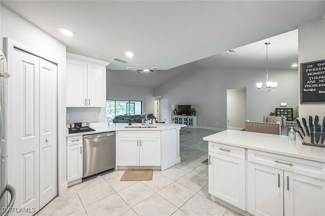 kitchen with dishwasher, white cabinets, sink, vaulted ceiling, and a chandelier