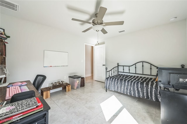 bedroom with light tile patterned floors and ceiling fan