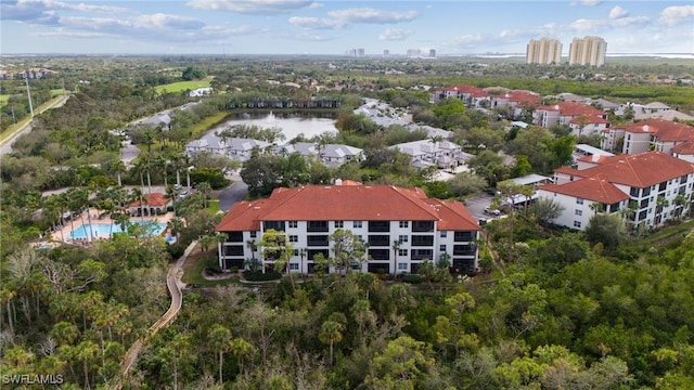 drone / aerial view with a water view