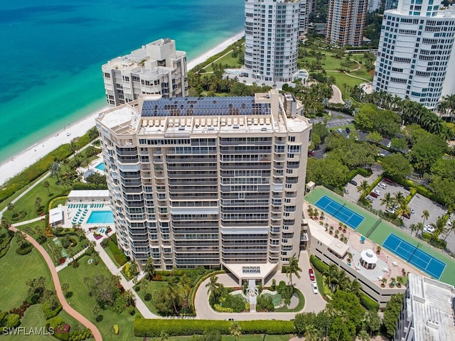 aerial view featuring a water view and a beach view