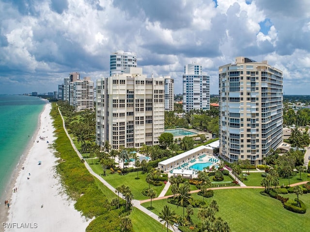 view of property featuring a water view and a view of the beach