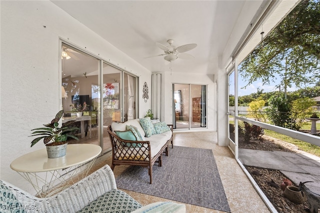 sunroom / solarium with ceiling fan