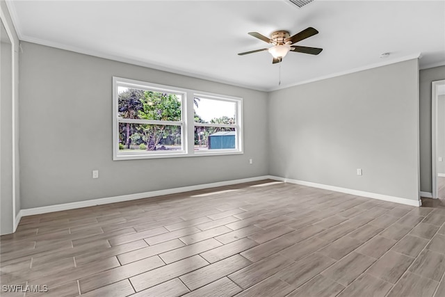 empty room featuring ceiling fan, crown molding, and light hardwood / wood-style flooring