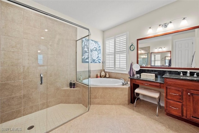 bathroom featuring plus walk in shower, tile patterned floors, and vanity