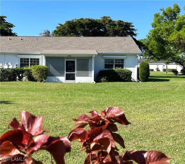 view of home's exterior with a yard