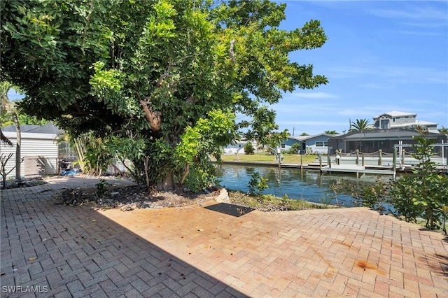 view of patio / terrace with a water view