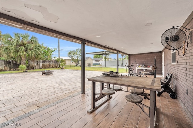 view of patio with an outdoor fire pit