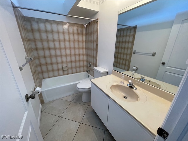 full bathroom featuring tile patterned floors, toilet, vanity, and tiled shower / bath