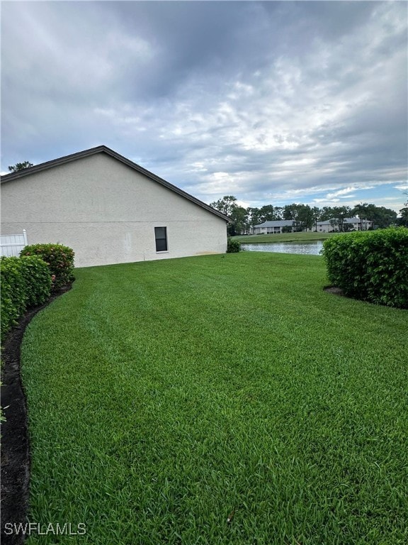 view of yard with a water view