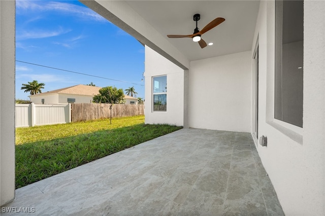 view of patio with ceiling fan