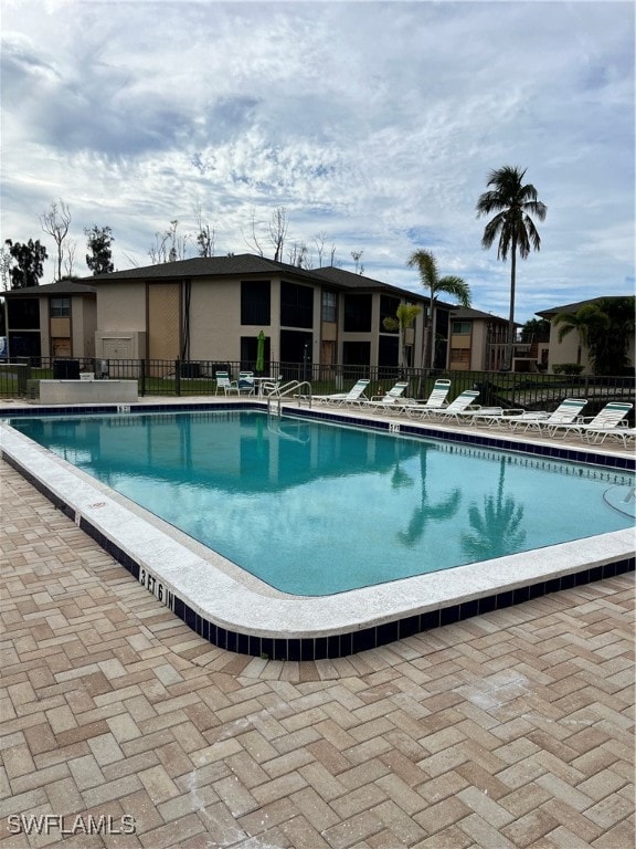 view of pool featuring a patio