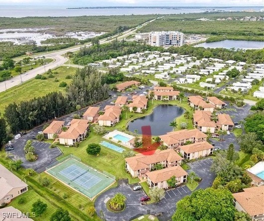 birds eye view of property featuring a water view