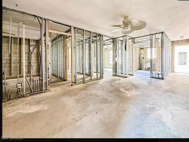 miscellaneous room featuring ceiling fan