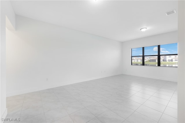 view of tiled spare room