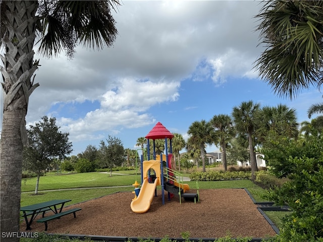 view of jungle gym with a yard