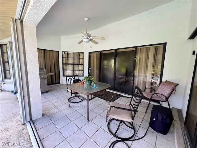 view of patio featuring a grill and ceiling fan