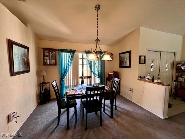 dining space with dark carpet and vaulted ceiling