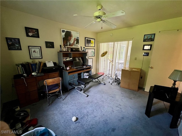 carpeted home office with ceiling fan