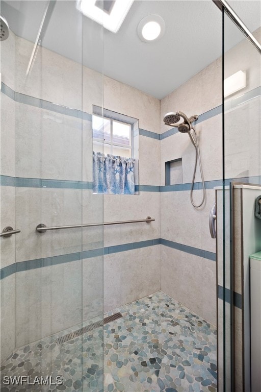 bathroom with an enclosed shower