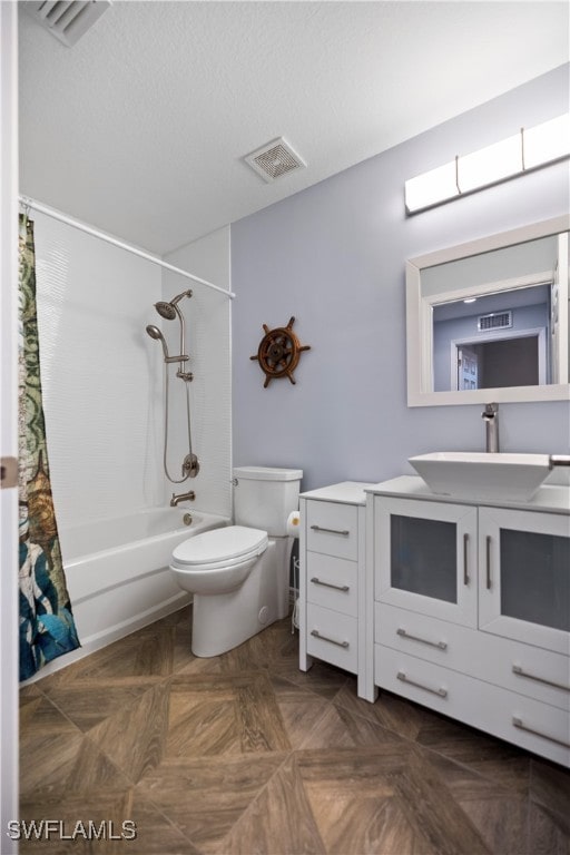 full bathroom with vanity, toilet, parquet floors, and shower / tub combo