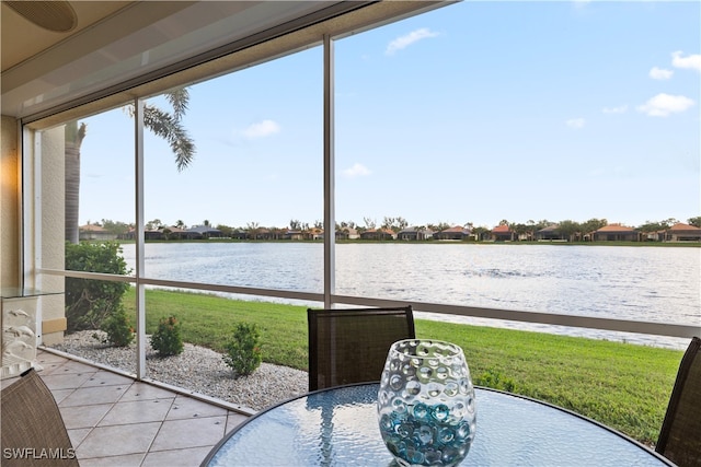 sunroom with a water view