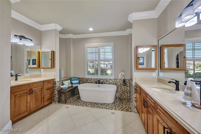 bathroom featuring a tub, plenty of natural light, and crown molding