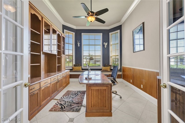 office featuring light tile patterned floors, wainscoting, ceiling fan, and ornamental molding