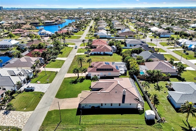 bird's eye view with a water view