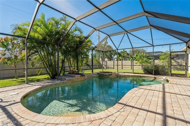 view of swimming pool with a patio and glass enclosure