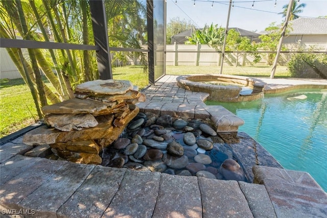 exterior space with a pool with hot tub