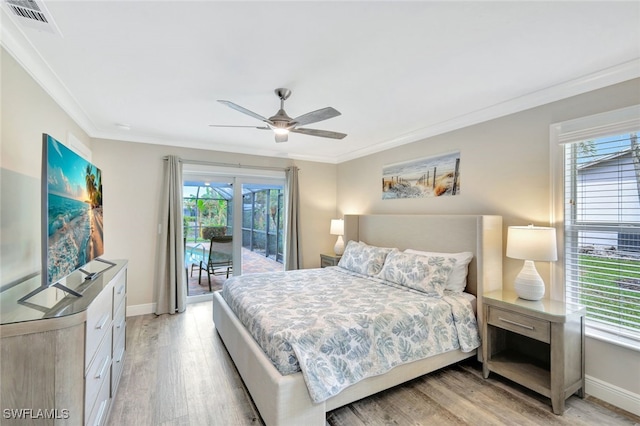 bedroom featuring multiple windows, ceiling fan, light hardwood / wood-style floors, and access to exterior