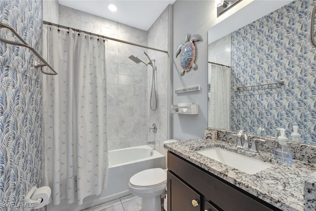 full bathroom with shower / bath combination with curtain, tile patterned floors, vanity, and toilet