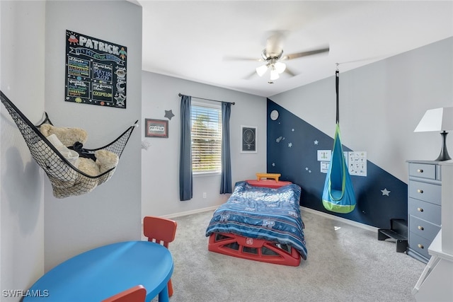 bedroom featuring ceiling fan, lofted ceiling, and carpet