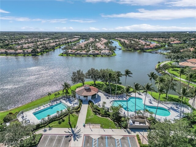 bird's eye view with a water view